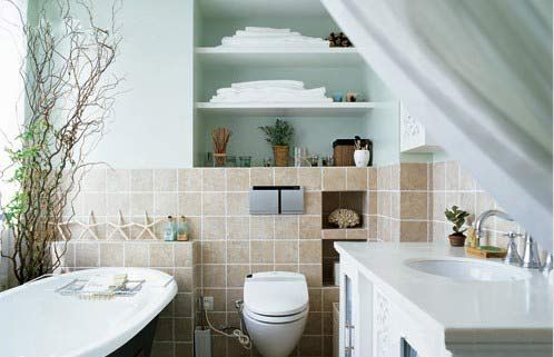 浅棕色的瓷砖与灰湖绿色的墙漆令浴室的墙壁产生了植物般的生命力
