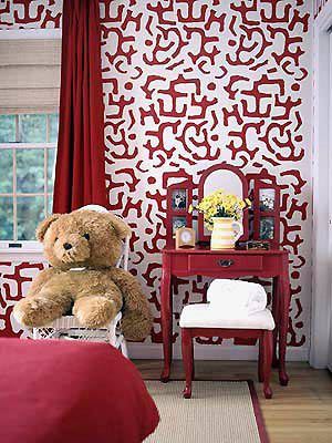 床品墙纸以及梳妆台基本同一系列的红色