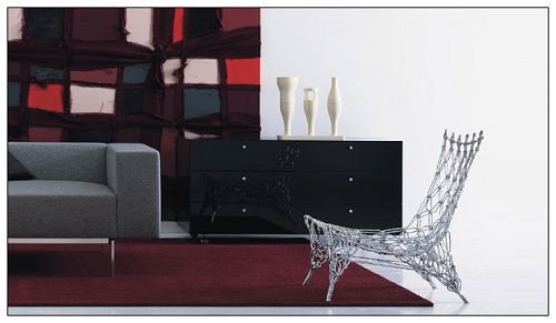 马塞尔-万德斯在1990年代设计的一款名为 Knotted chair的编织椅