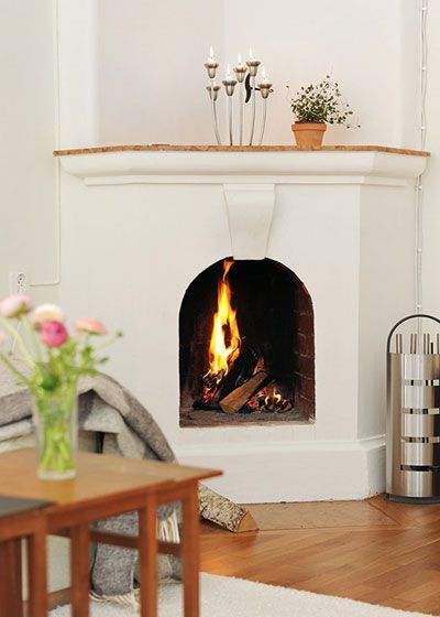 如果想欧洲风味更重的话在客厅的角落添置一个壁炉