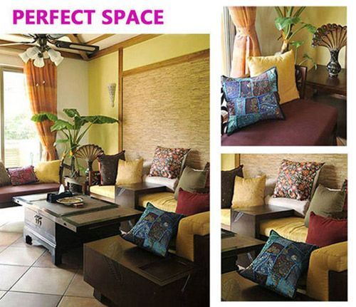 浓厚的东南亚风格客厅温和地与窗外阳光相接，加上角落的小植物，整个室内空间格外的生机，感受无比自然的休闲时光，精致的小抱枕放在沙发上，像是跳跃的蝴蝶在飞翔