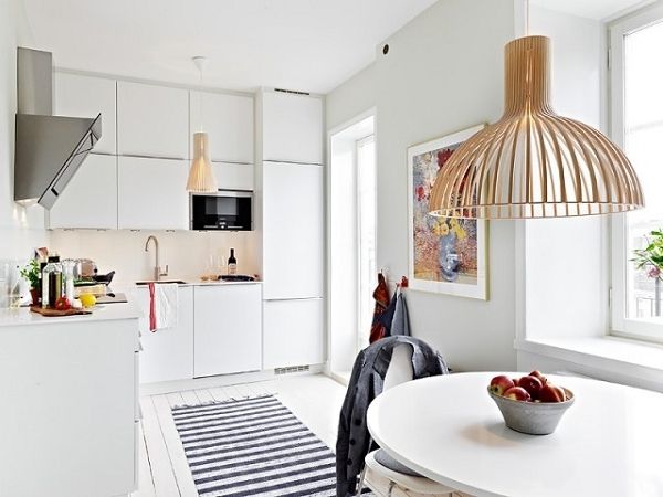 62平整洁北欧式公寓 浅色地板搭配纯白居室 